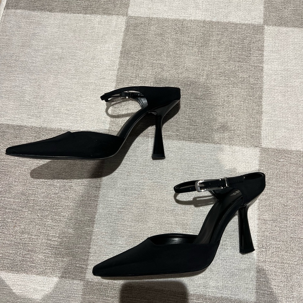 Black instep heeled mules